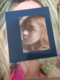 背面標籤撕損，正面完好（無CD）