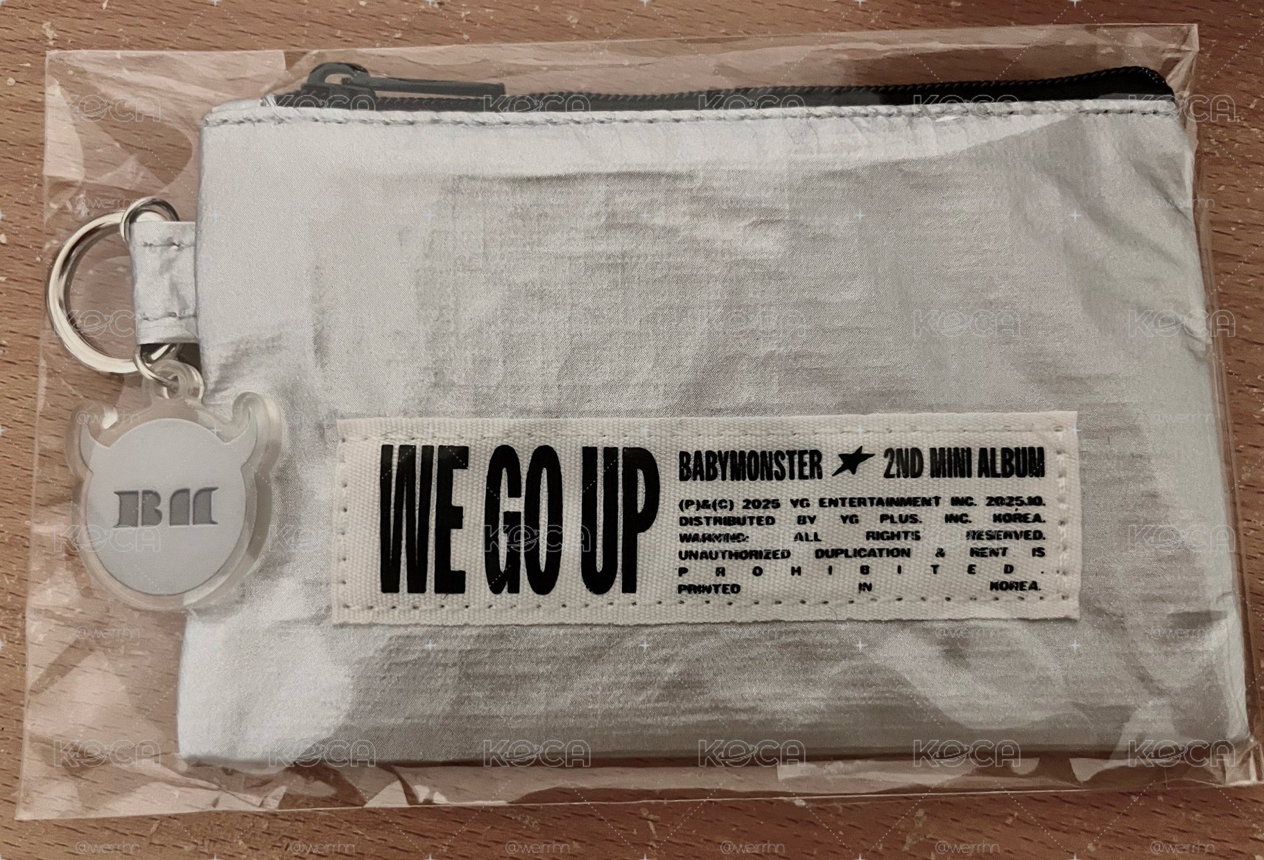 we go up 零錢包