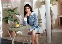 多（藍衣手拿檸檬）