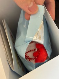 員娃娃（僅撕開一角