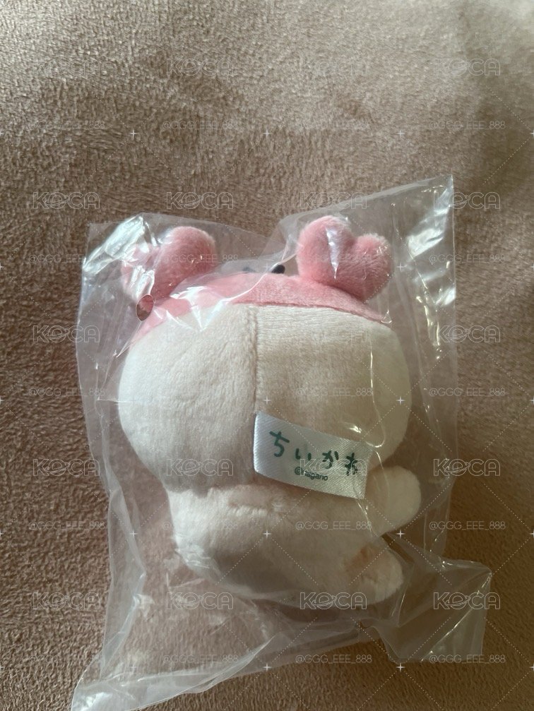 古本 夾手娃