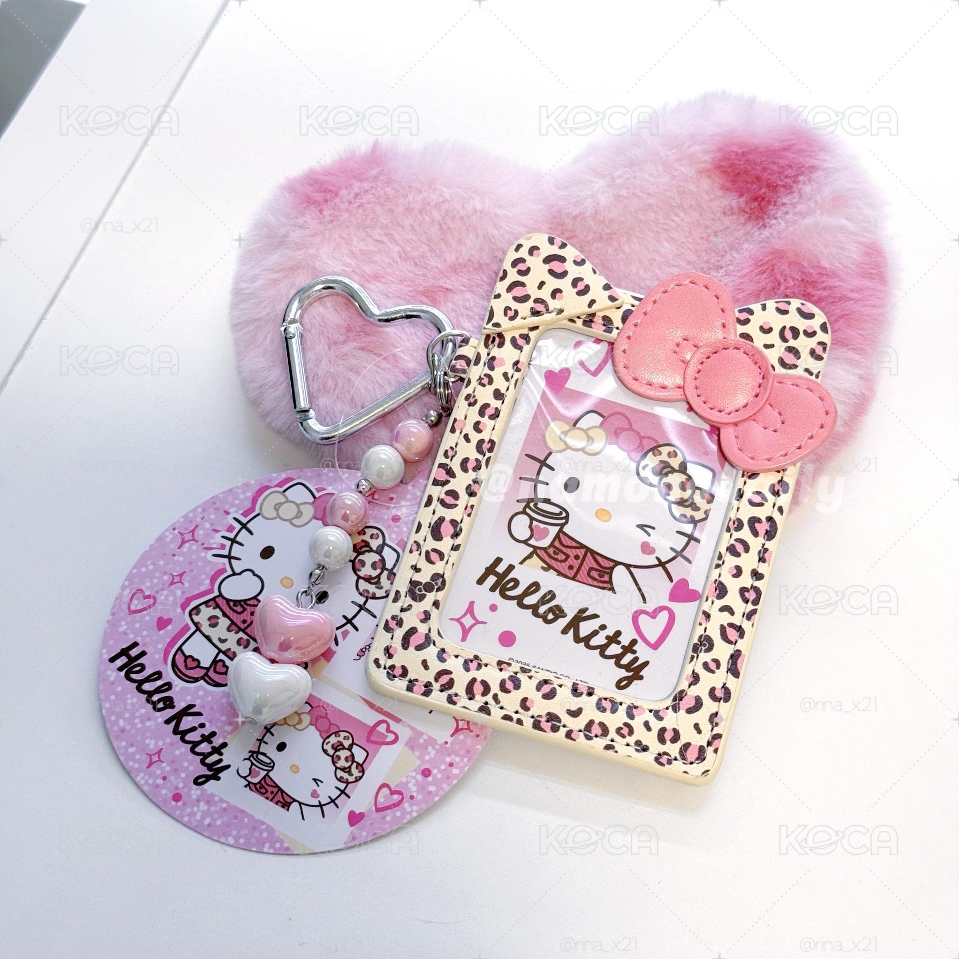 𝜗𝜚˚⋆Hello Kitty 愛心扣豹紋皮質卡套⸝⋆