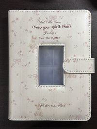 花花四宮格六孔卡冊（裡面有大約十頁藍光內頁）