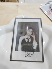 面迷七比心拍立得