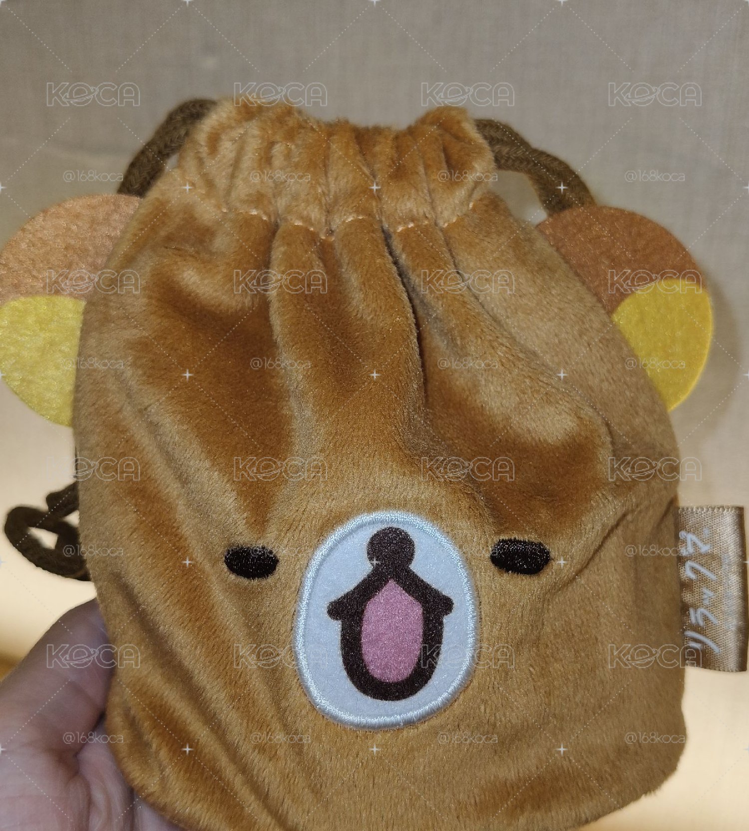 拉拉熊閉眼特殊表情束口袋