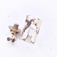 坐著明
