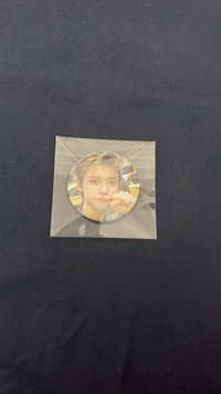 然竣徽章