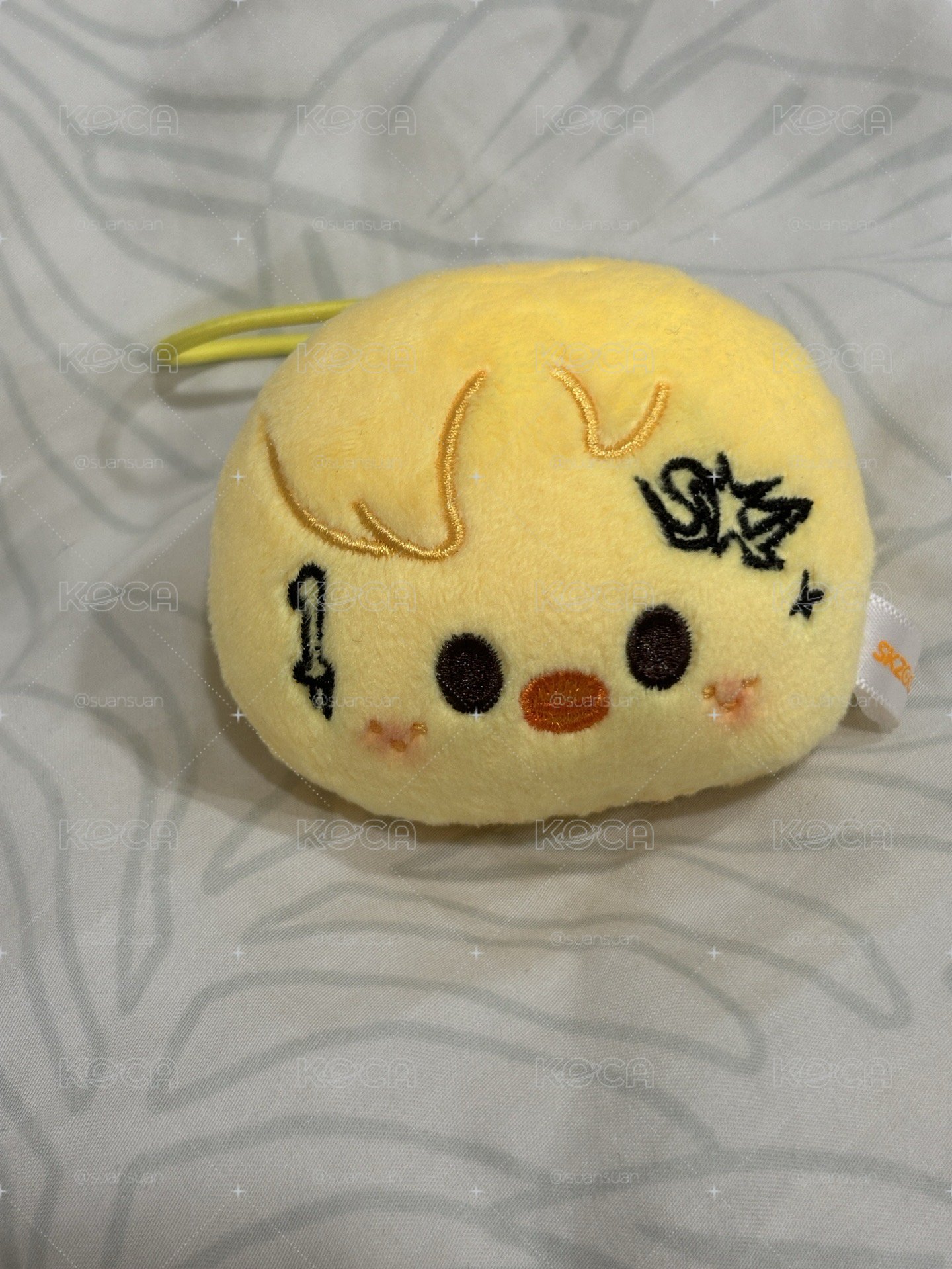 菲行李吊牌娃