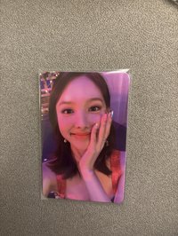 迷十摸臉娜