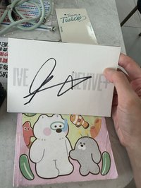 麗簽名明信片