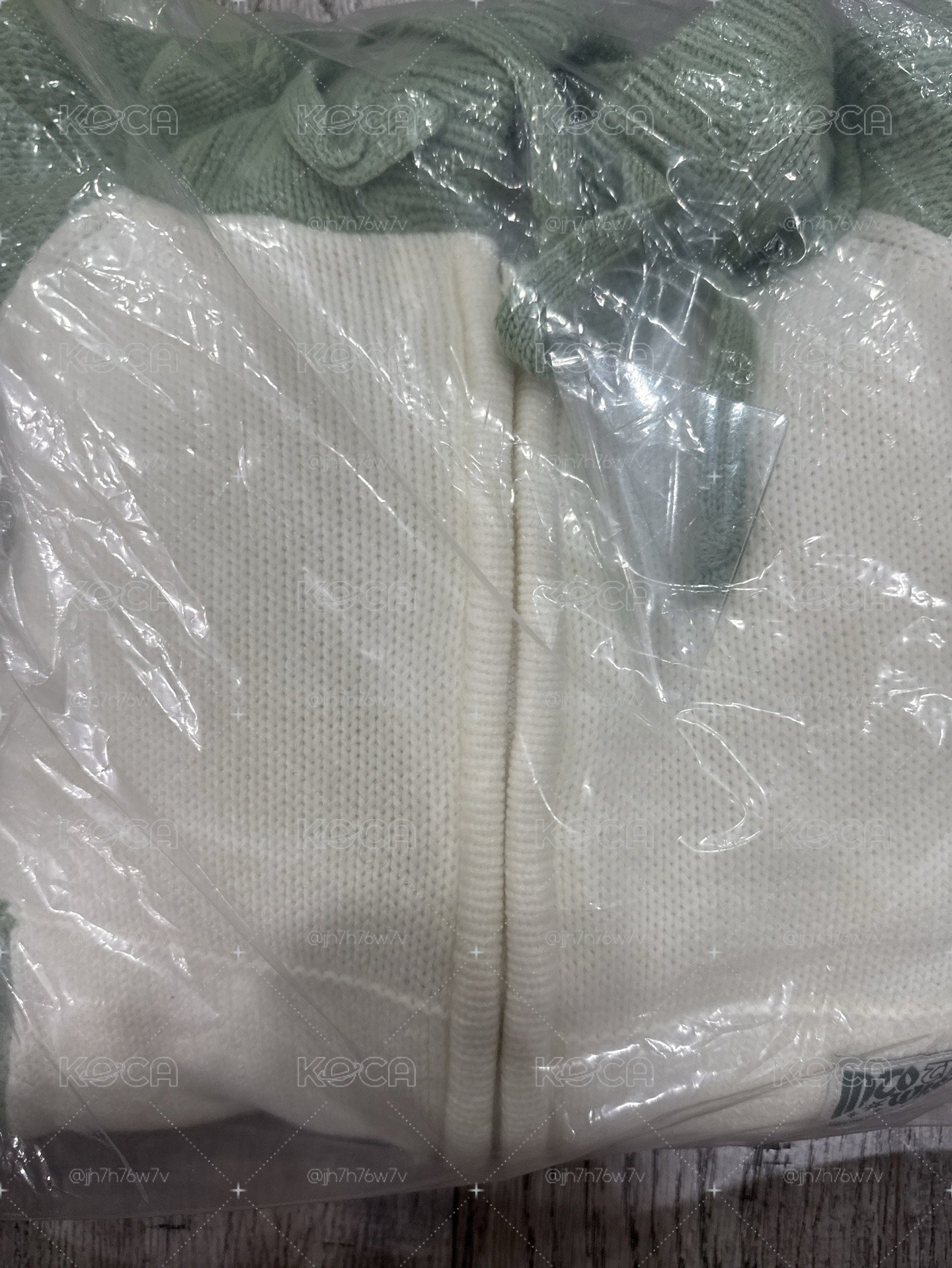 全新未使用過短版針織外套
