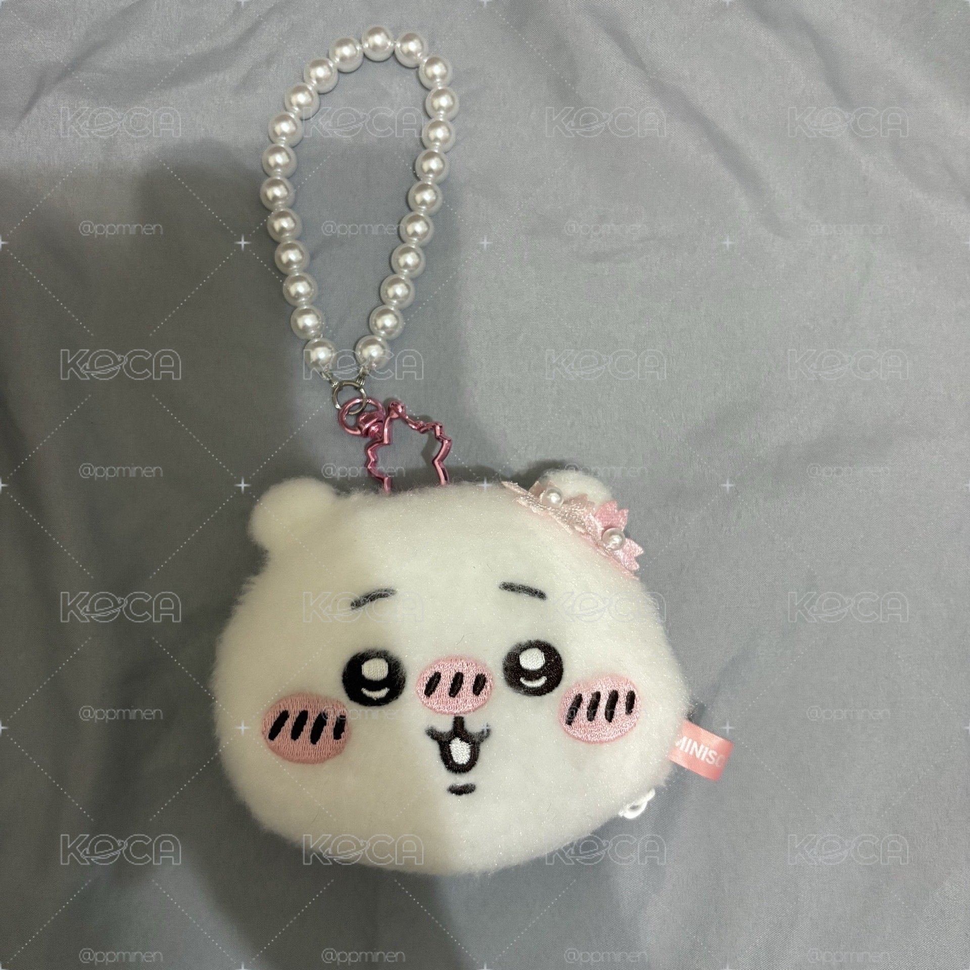 名創櫻花吉伊手拿包