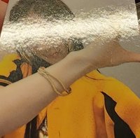世巡露（正面有凹痕背面有殘膠