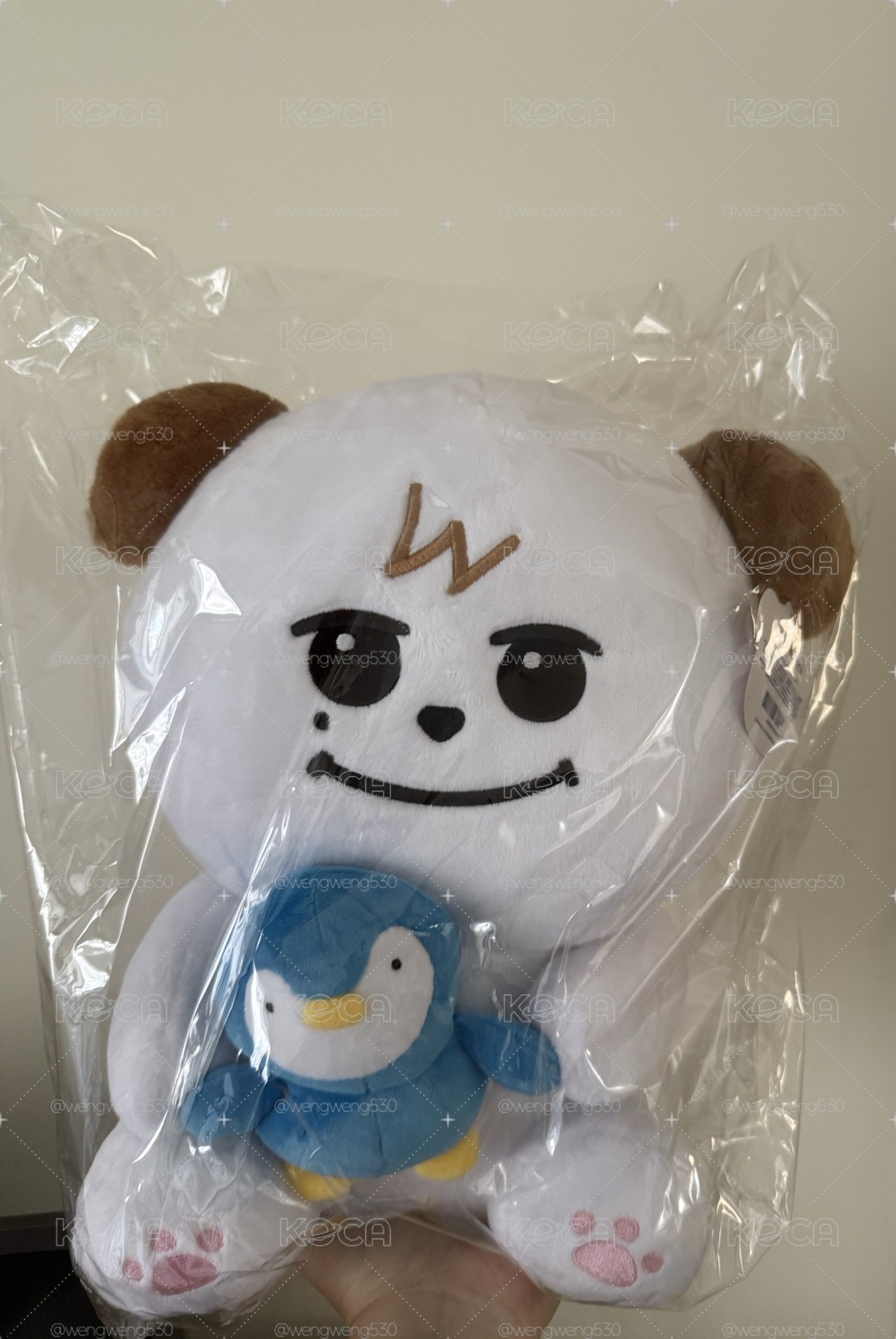 手抱企鵝咩
