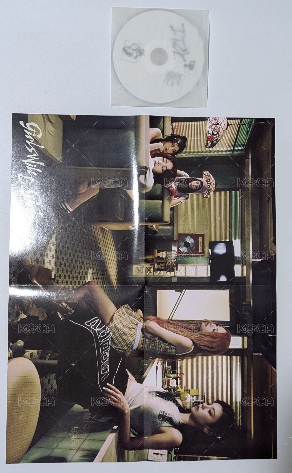 E. 普版寫真本+底片+CD+海報