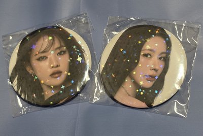 妮面徽章