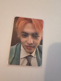 橘髮西裝哲