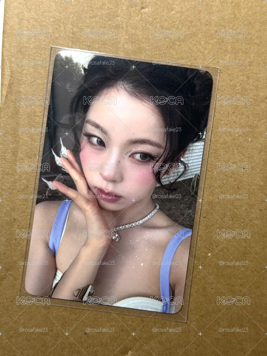 NMIXX 捧臉圭