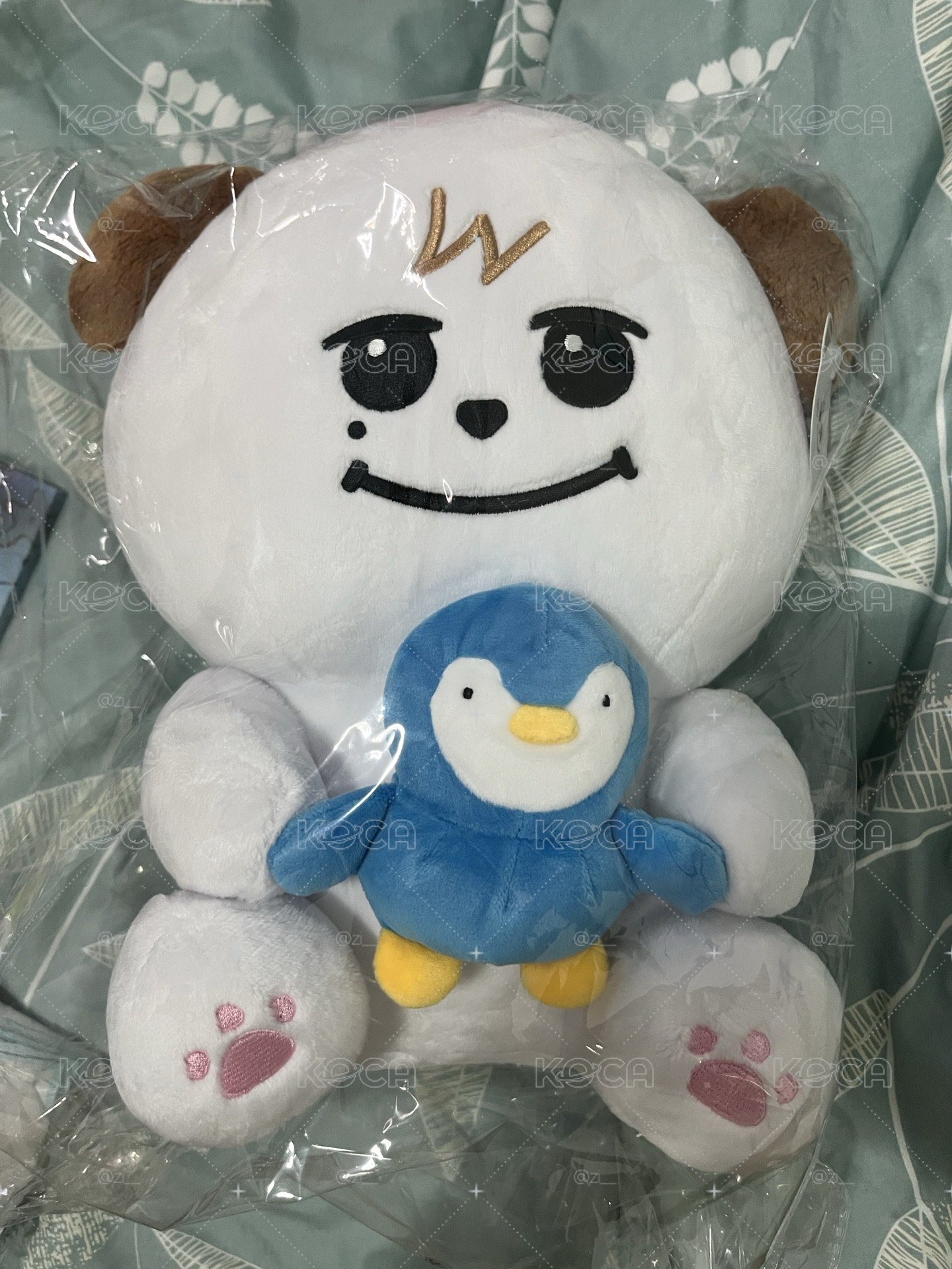 手抱企鵝
