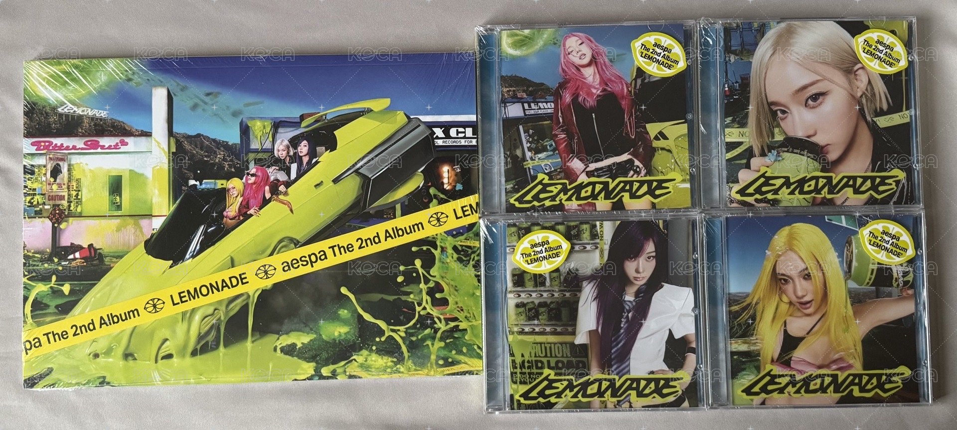 一本 LEMONADE Ver.  美版親簽 +  一套四本單封CD 