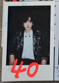 黑衣拍立得