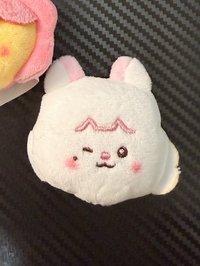妮眨眼