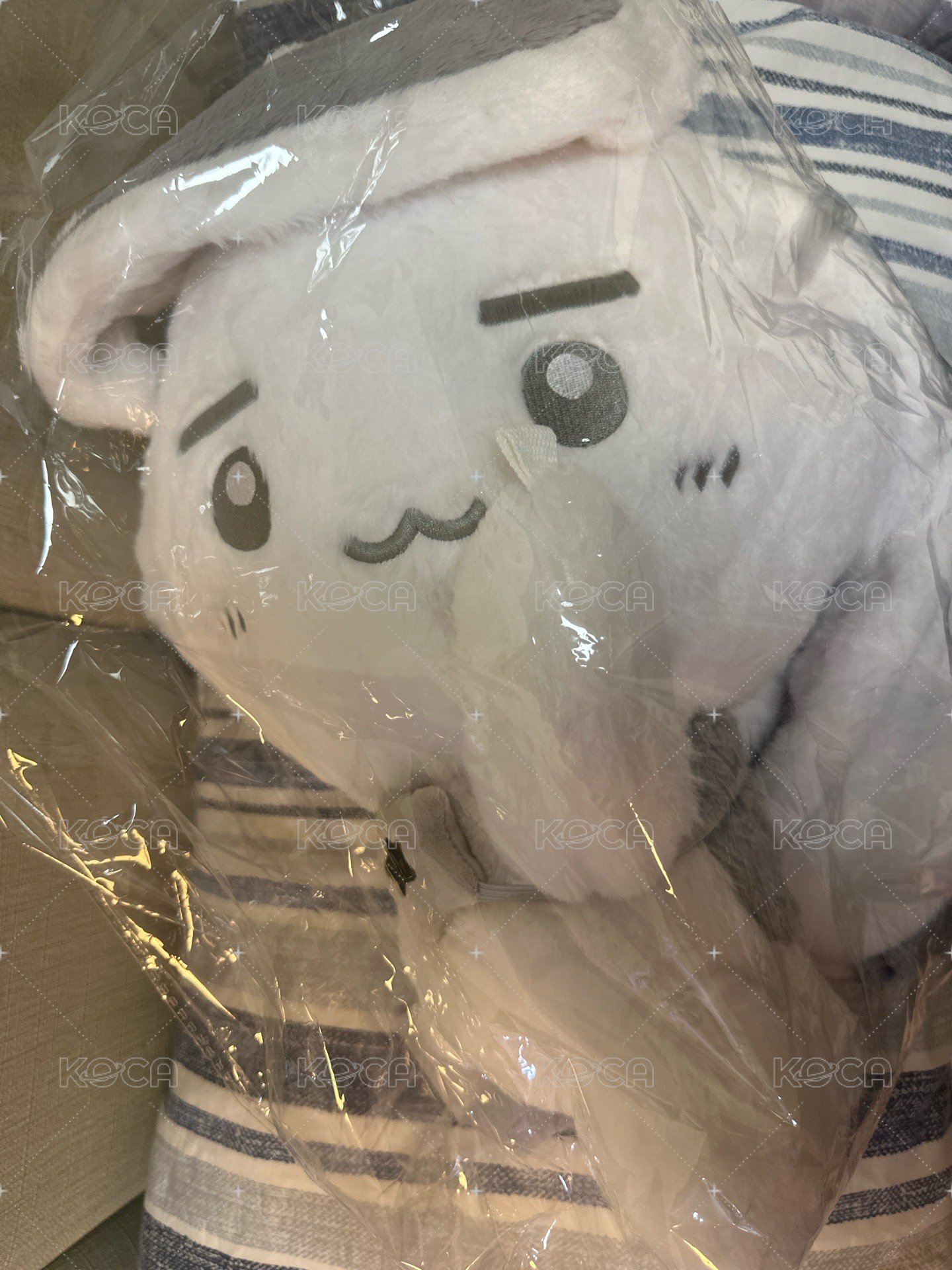 特大娃（僅打開檢查確定有小卡 小卡還在娃娃內）