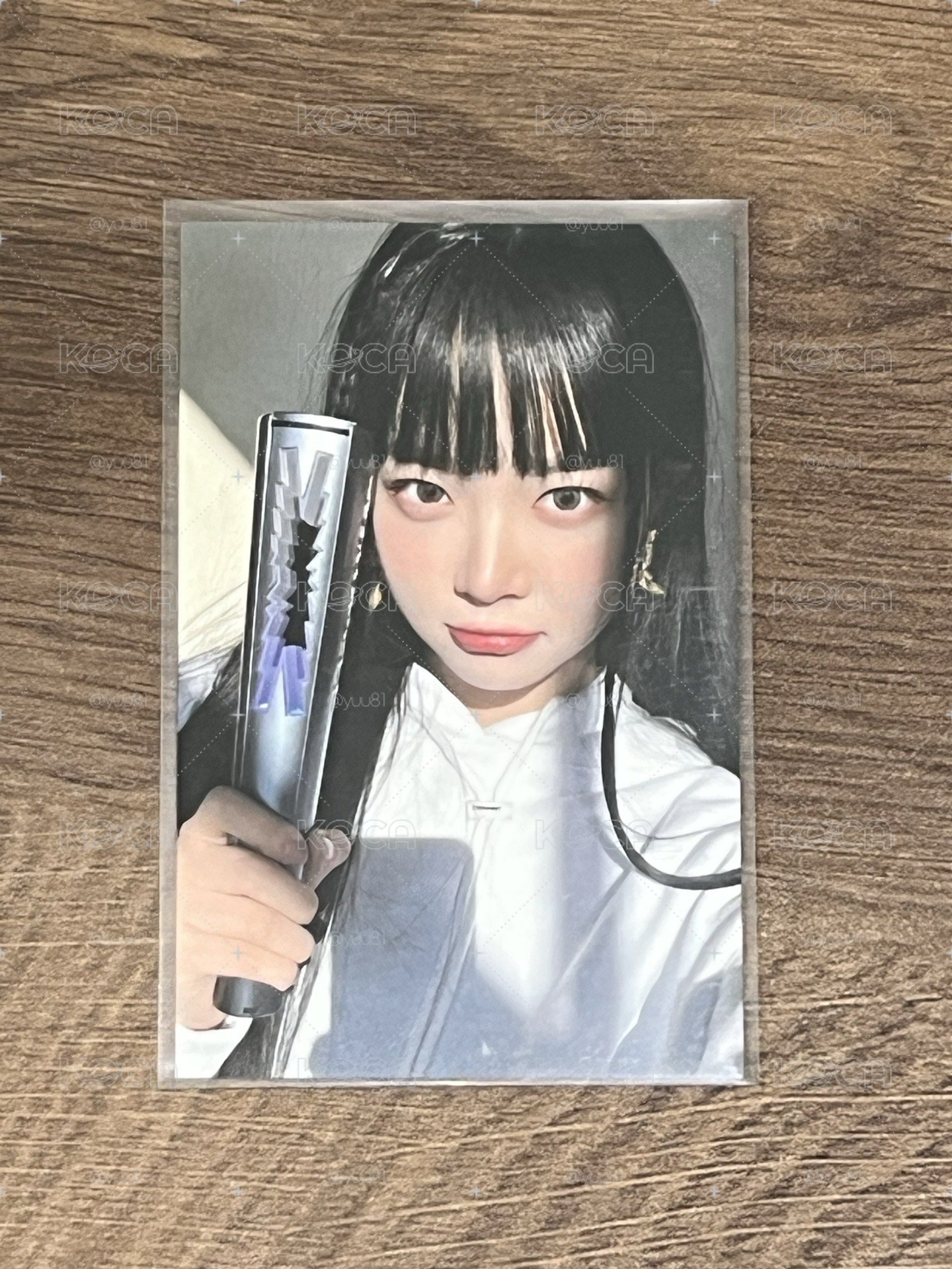 入場採