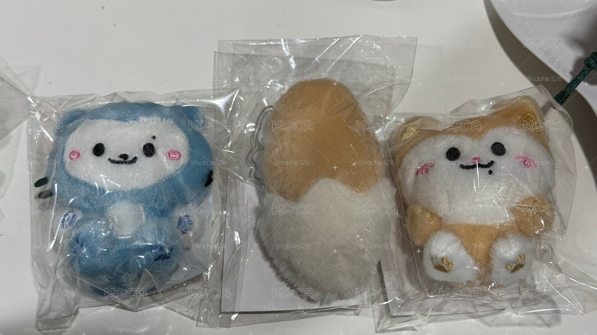 領留坐姿娃/領尾巴
