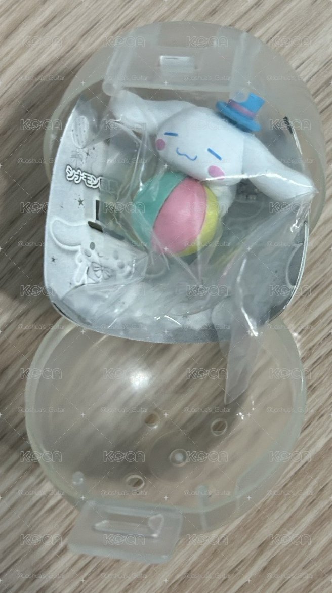 閉眼踩鋼絲彩球大耳狗吊飾