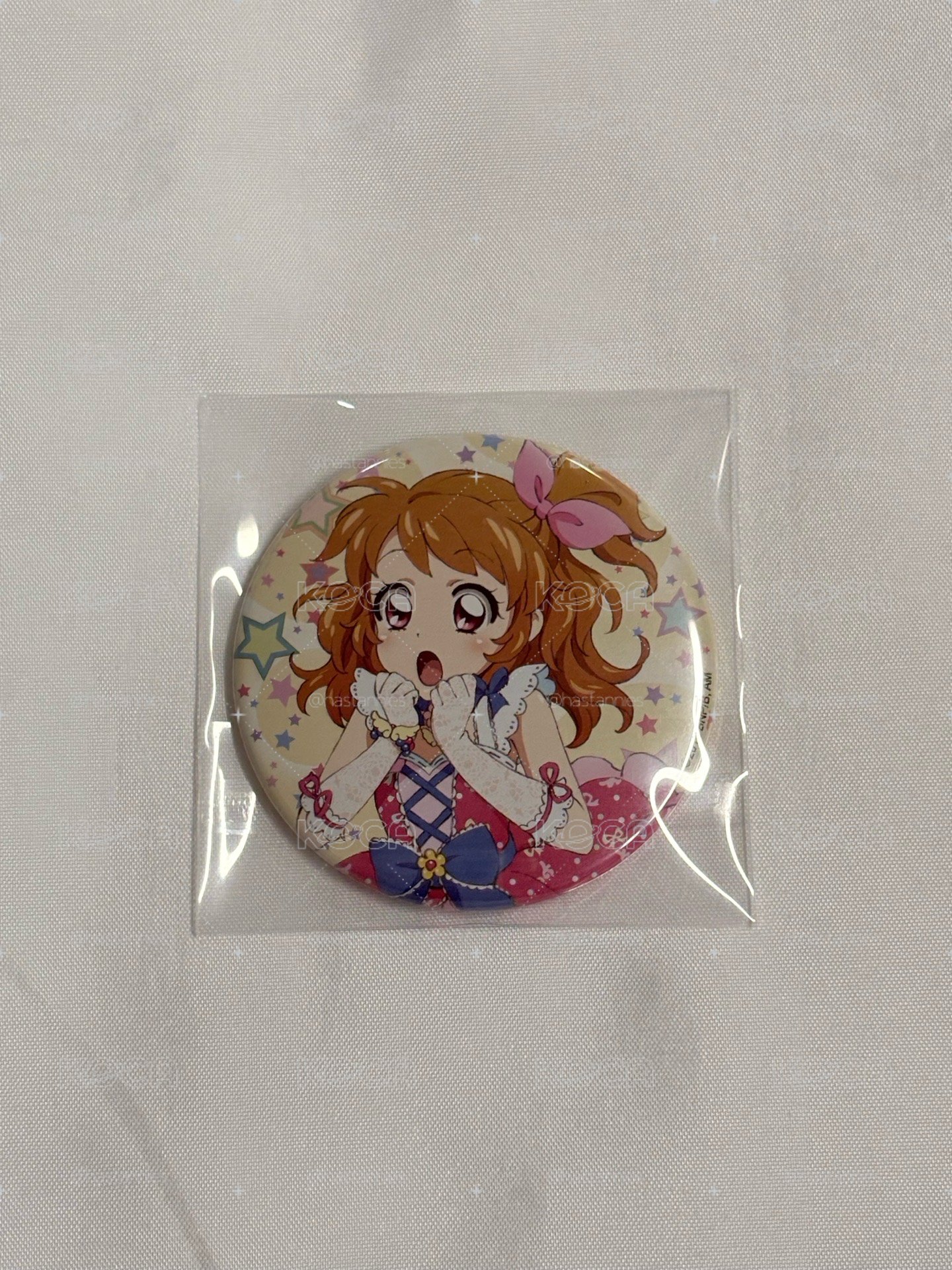 明里徽章