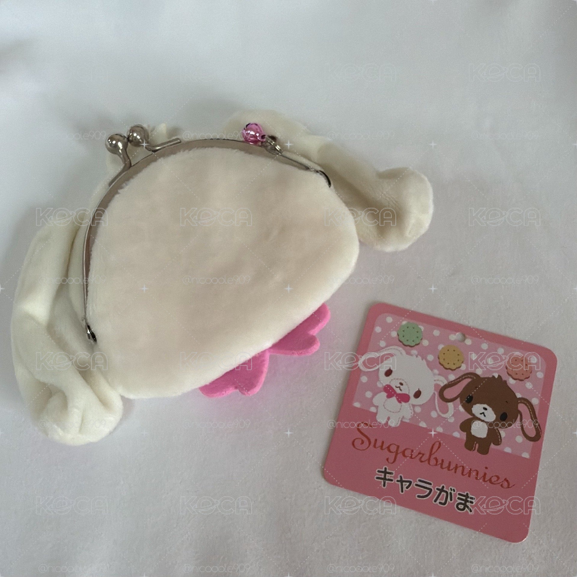 蜜糖邦尼口金包