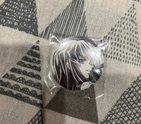 大頭小徽章