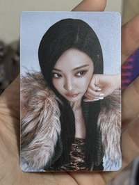 看側邊拳頭托臉